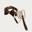 Maison Pupa brown velvet dog collar with bow tie and matching cream rope leash featuring gold-tone hardware.