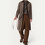 Maison Pupa brown velvet and cream rope dog leash worn crossbody by a man in a brown coat and trousers