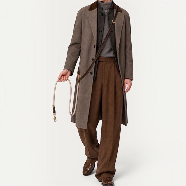 Maison Pupa brown velvet and cream rope dog leash worn crossbody by a man in a brown coat and trousers